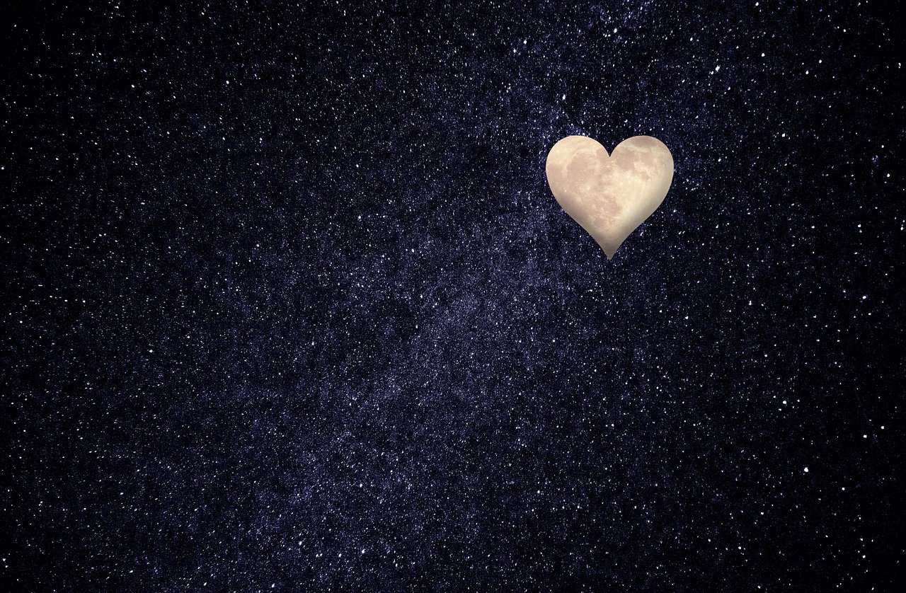 Heart-shaped moon in a starry sky